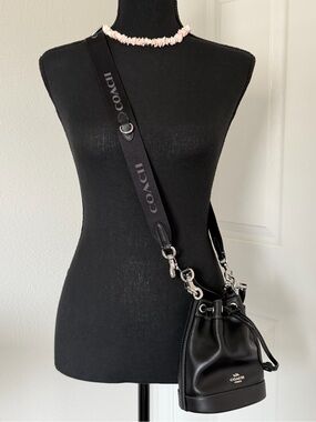 Coach Black Mini Leather Drawstring Crossbody with Logo Strap